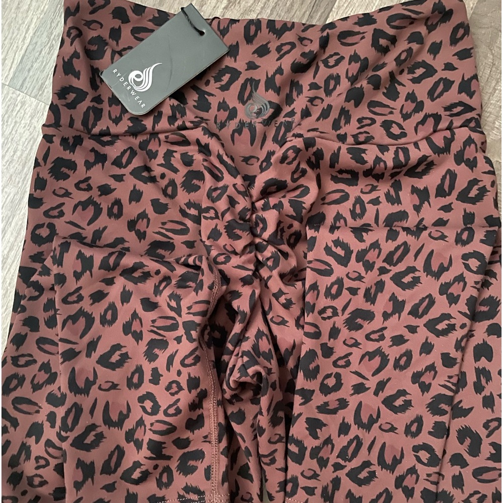 Brand new leggings with tags. Scrunched